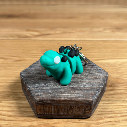 3D Stegosaurus Schlüsselanhänger – Dinosaurier Design in Grün und Schwarz - Alinova